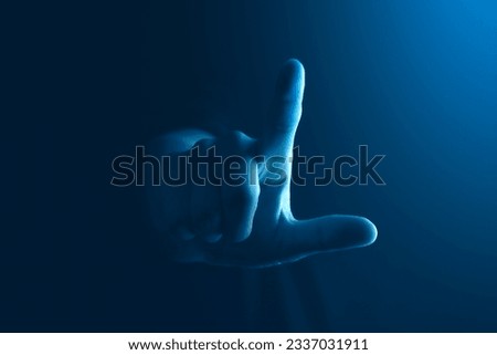Business man hand finger touch gesture symbol human pointing sign concept on dark blue background of digital person showing blank touchscreen technology or success ideas growth development analysis. Royalty-Free Stock Photo #2337031911