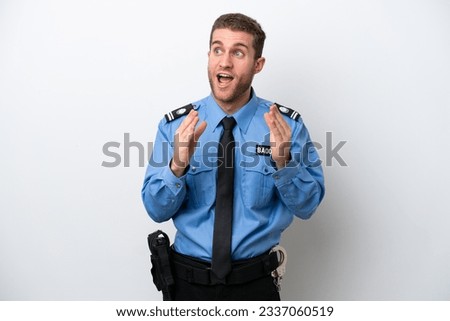 Young police caucasian man isolated on white background with surprise facial expression
