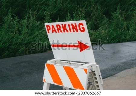 a parking sign in the park
