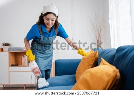 Housework or house keeping service female cleaning dust in home, cleaning agency small business. professional equipment cleaning old home. Royalty-Free Stock Photo #2337067721