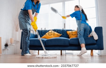 Housework or house keeping service two female cleaning dust in home, cleaning agency small business. professional equipment cleaning old home. Royalty-Free Stock Photo #2337067727