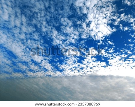 Semarang, Indonesia - July 18, 2023 : Appearance of strange clouds that resemble waves.