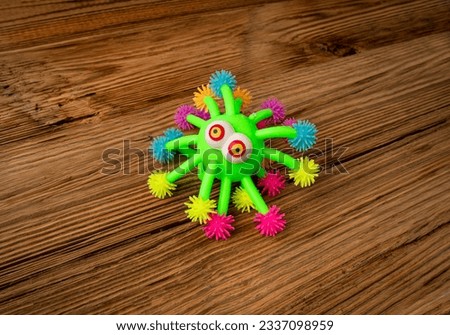Bright Colored Toy, Colorful Squeeze Antistress Toys, Soft Squishy Spider on Elastic Band, Color Plastic Puffer Balls, Fun Luminous Stressball, Rubber Monster Hedgehog Royalty-Free Stock Photo #2337098959