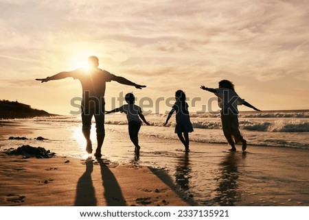 Silhouette, family is running on beach and back view with ocean waves, sunset and bonding in nature. Energy, action people outdoor on tropical holiday and freedom, travel with trust and love