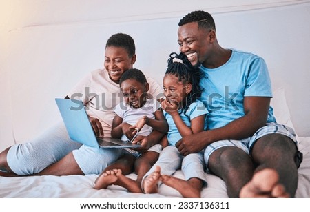 Laptop, black family and relax in a bed with movies, games and streaming in their home. Online, film and children with parents in bedroom for weekend fun, subscription or cartoon, care and smile
