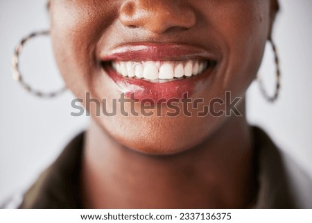 Smile, happy and mouth closeup of black woman with teeth whitening, dental care and wellness. Healthcare, dentistry and face zoom of female person with cleaning for hygiene, grooming and treatment Royalty-Free Stock Photo #2337136375