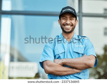 Happy man, portrait and security guard with arms crossed in city for career safety or outdoor protection. Male person, police or officer smile in confidence, law enforcement or patrol in urban town Royalty-Free Stock Photo #2337136845