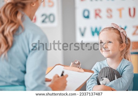 Girl child, psychologist and writing with notes, smile and listening for support, help and school counselling program. Woman, female kid and conversation for mental health, psychology and wellness Royalty-Free Stock Photo #2337137487