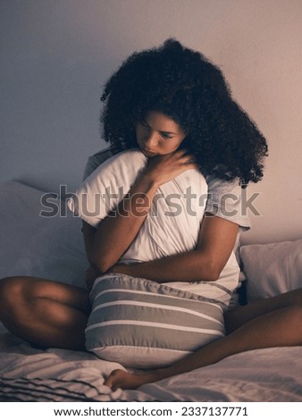 Sad, woman and bedroom with depression and pillow hug at home with anxiety. House, female person and thinking of mental health, or insomnia in bed with stress and frustrated feeling lonely from fail Royalty-Free Stock Photo #2337137771