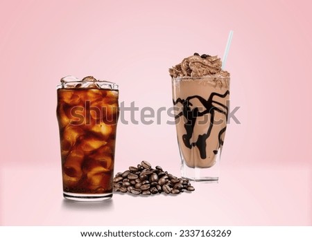 Ice coffee in a glass with cream and aroma beans.