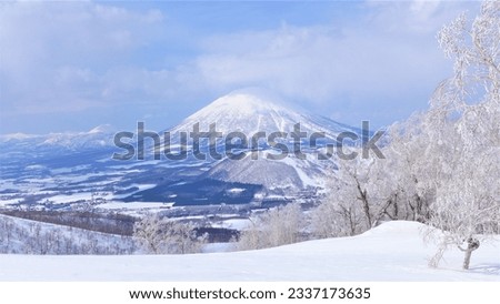 Beautiful mountains and Ski slope of Rusutsu ski resort in Hokkaido Japan. the best place for skiing. People are skiing and snowboarding . powder snow. Royalty-Free Stock Photo #2337173635
