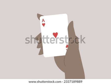 A hand holding the ace of hearts