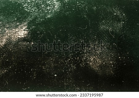 Blank grained film strip texture background with heavy grain, dust and finger prints
