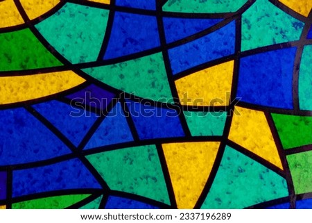 Multicolored stained glass mosaic. Abstract background. Royalty-Free Stock Photo #2337196289