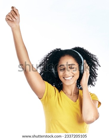 Dance, music and a woman with headphones in studio streaming audio, sound or radio. Energy, happy and a young african person isolated on a white background listening and moving to fun song to relax