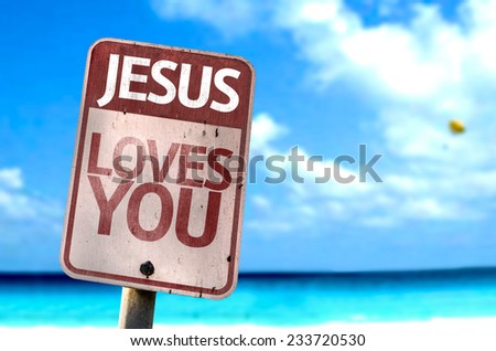 Jesus Loves You sign with a beach on background