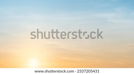 Sunset sky clouds in the evening with Yellow, Orange sunlight and blue sky, Horizon sky in Summer  Royalty-Free Stock Photo #2337205431