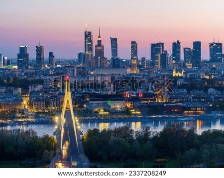 Evening aerial panorama of Warsaw city center, Vistula river and Swietokrzyski bridge Royalty-Free Stock Photo #2337208249