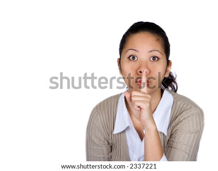 Lady with her index finger to her mouth, requesting silence or sign for secrecy.