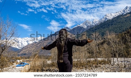 View at Manali, Himachal Pradesh, India. Beas river along side Manali snow mountains Himachal Pradesh, India. Manali is the best destination for honeymoon and holidays. Green nature in Manali, India. Royalty-Free Stock Photo #2337224789