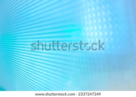 Background texture of blue light on glass window with square pattern, abstract background, design for backdrop or invitation card.