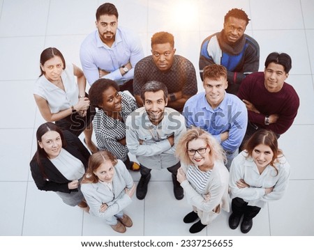 Group of young different people looking up
