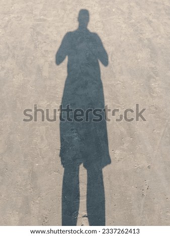 photo of shadow on beach sand