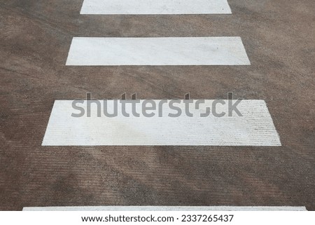 Black and white striped on the street or crossroad for transportations sign background