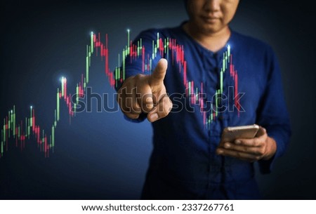 businessman pointing pointing stock graph patterns icon with smartphone . Stock market and stock investment concept.