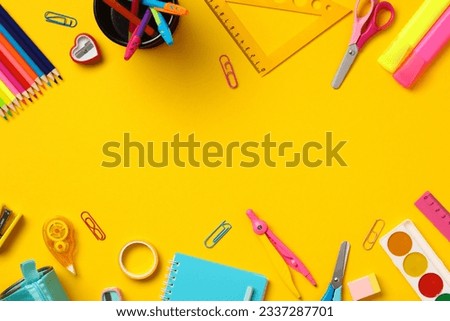 Back to school banner design. Colorful school supplies on yellow background. Flat lay, top view.