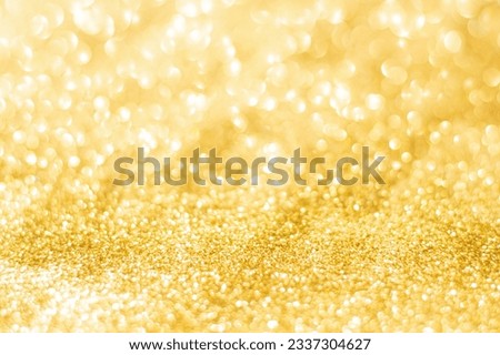 Gold glitter defocused texture background. gold christmas abstract background
