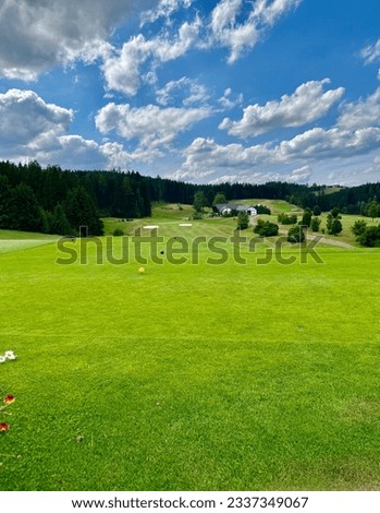 First tee on the golf course in the summer countryside
