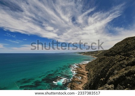 Northeast-southwest view along the Colac Otway Shire coast on the Bass Strait-Southern Ocean with Skenes Creek locality and Apollo Bay town in the central and far backgrounds. Victoria-Australia. Royalty-Free Stock Photo #2337383517