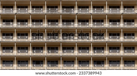 Urban photograph of facade of an apartment building with balconies. Seamless pattern. Street of Georgian city of Tbilisi, concept of architecture, construction, housing rental, buying an apartment