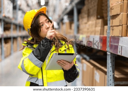 Portrait asian engineer woman shipping order detail check goods and supplies on shelves with goods background inventory in factory warehouse.logistic industry and business export