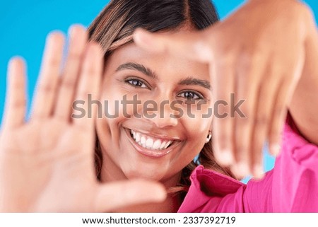 Woman, finger frame and smile on face in studio for beauty, cosmetics and natural makeup. Portrait of a happy model person with hands or perspective for photography, selfie or creative picture
