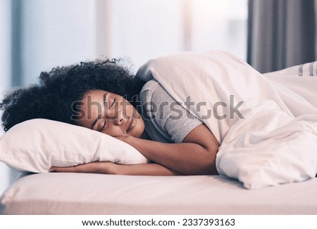Sleeping, woman and bed with nap at home in morning with rest feeling calm with peace. House, bedroom and tired female person relax and comfortable on a pillow with blanket dreaming over the weekend