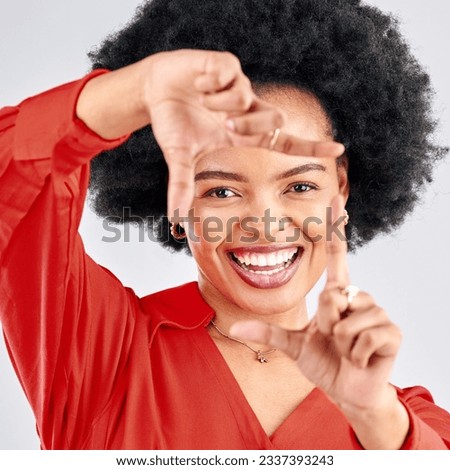 Portrait, finger frame or face of black woman in studio to review profile picture on white background. Happy female model, hands or planning perspective of photography, selfie or creative inspiration