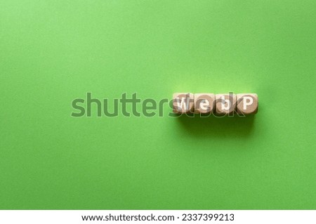 There is wood cube with the word WebP. It is an abbreviation for WebP as eye-catching image.