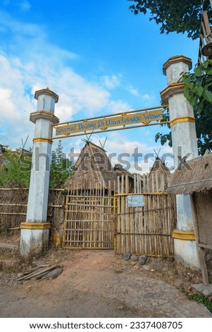 Selamat Datang di Uma Lengge Wawo or Welcoming entrance to Uma Lengge Wawo in english. Located in Bima, West Nusa Tenggara. The gate inviting visitors to explore the cultural heritage of Bima.