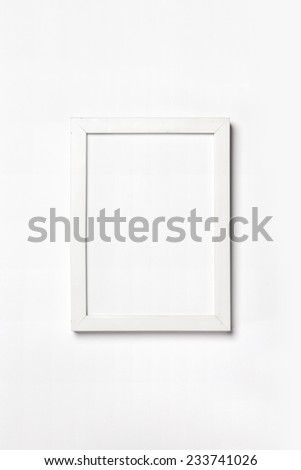 A white photo(picture) frame isolated white, top view at the studio. 