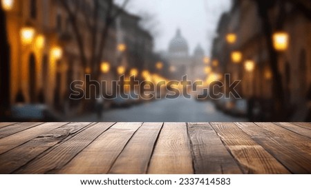The empty wooden table top with blur background of Rome street. Exuberant image.