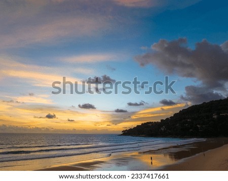 Drones take pictures of the beautiful sky by the beach in stunning sunset.
colorful sky in sunset above Karon city at sunset. 
Scene of romantic sky sunset background.
