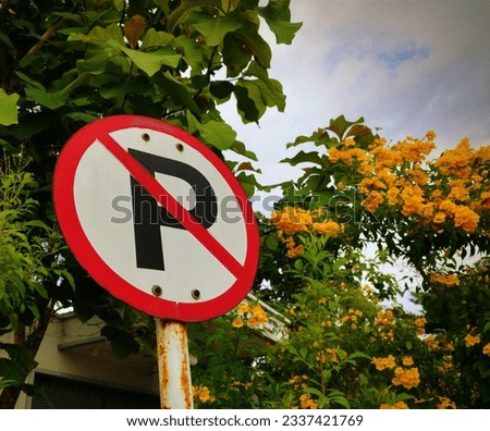 k̄hxng khuṇ

No parking traffic sign, otherwise the police will seize your car.

