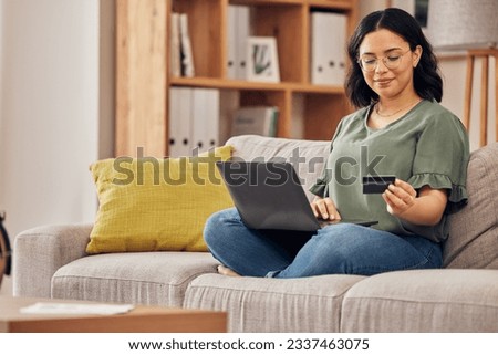 Laptop, credit card and woman of home online shopping, e commerce or fintech payment on sofa. Relax, loan and happy person on internet banking, e learning subscription and computer or web transaction Royalty-Free Stock Photo #2337463075