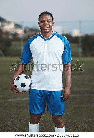 Soccer ball, ready or portrait of black man on field with smile in sports training, game or match on pitch. Happy football player, fitness or proud African athlete in practice, exercise or workout Royalty-Free Stock Photo #2337463115