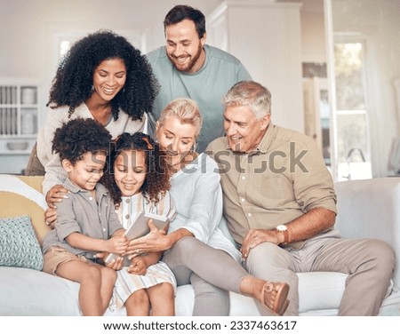 Big family, tablet and children in home, happy and bonding together in living room. Technology, multiracial kids and grandparents with parents in lounge streaming movie, video or film on social media