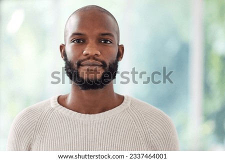 Black man with serious face in portrait, vision and confidence with empowerment and mockup space. Young African male person, determined with focus and confidence, ambition and casual fashion
