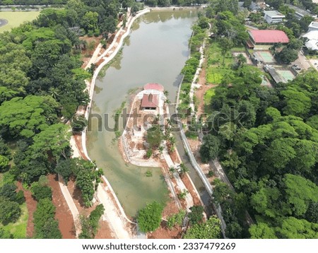 construction of a reservoir in the middle of a beautiful city using heavy equipment