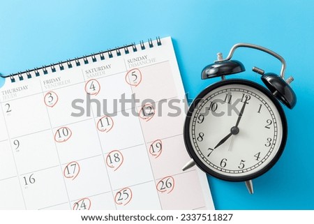Calendar and clock with 3 days off on blue background. Royalty-Free Stock Photo #2337511827